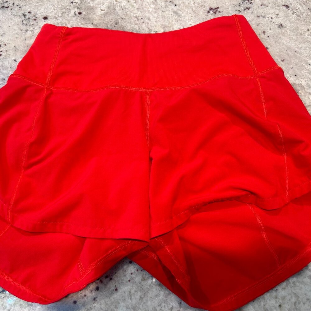 Red Lululemon speed up size 0 four inch